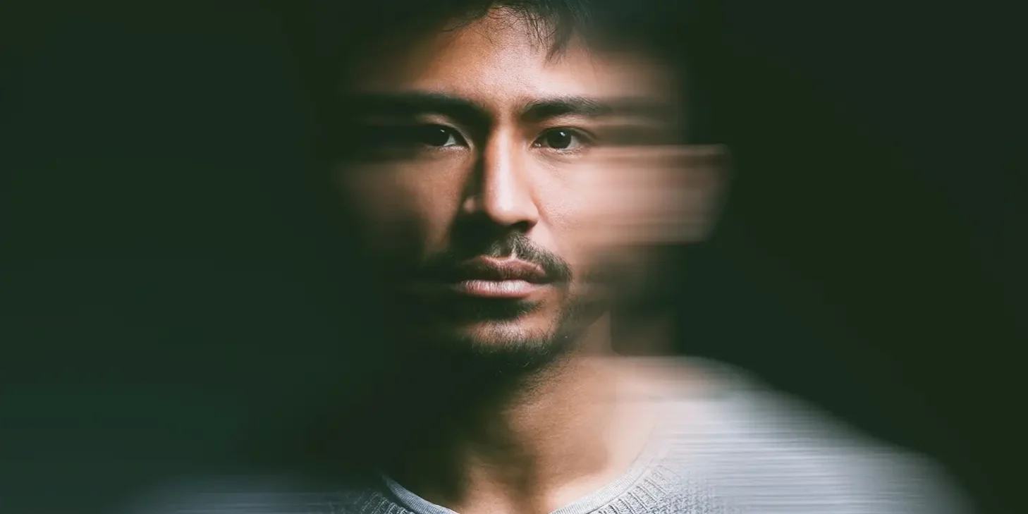 man face closeup dark background