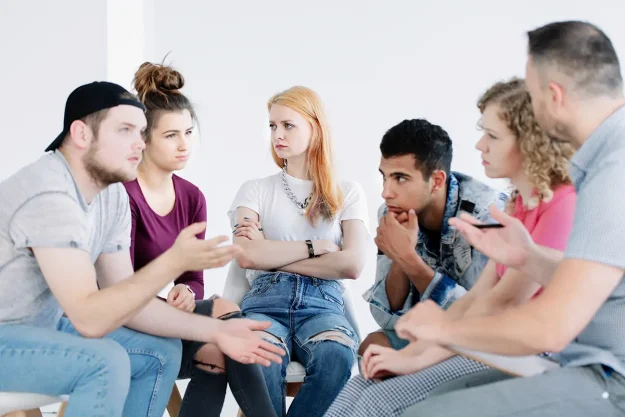 serious-people-talking-in-a-meeting-indoors-2026-03-10-02-05-40-utc